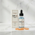 Glow Treatment Duo — eye mask patches and copper peptides firming serum on marble background